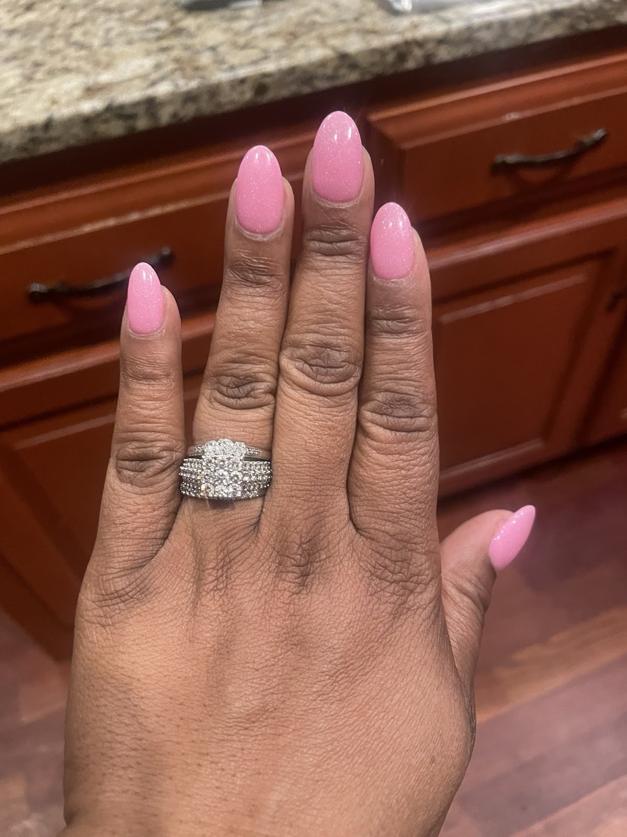 Pink shimmer almond gel nails